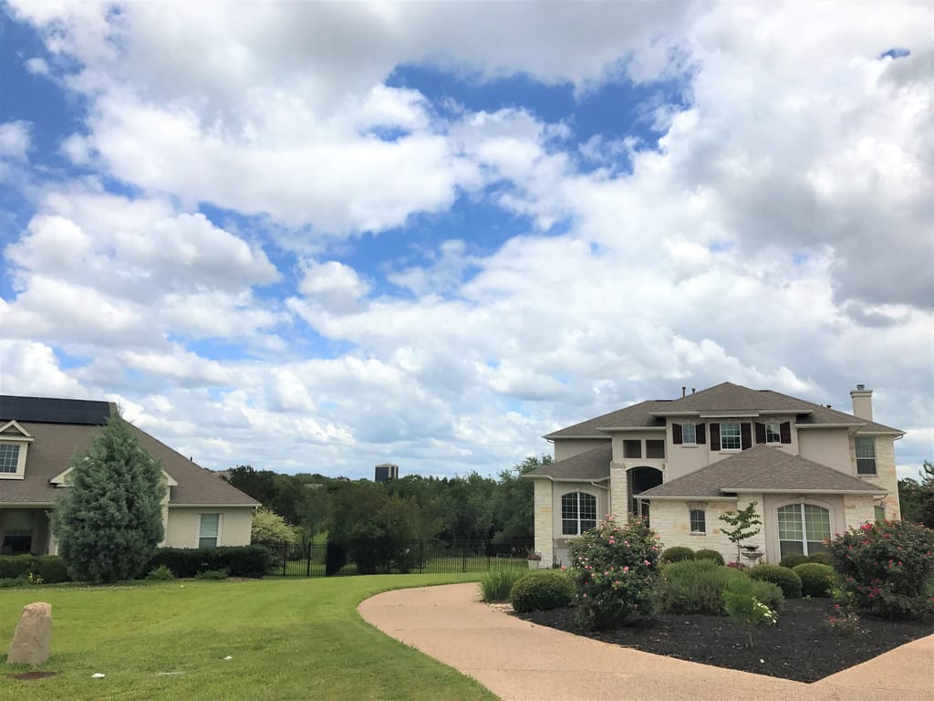An older Austin home with original detailing on a quiet residential street.