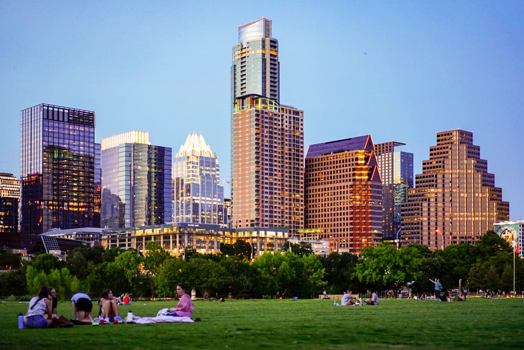 The Austin skyline seen across open ground on a clear day.