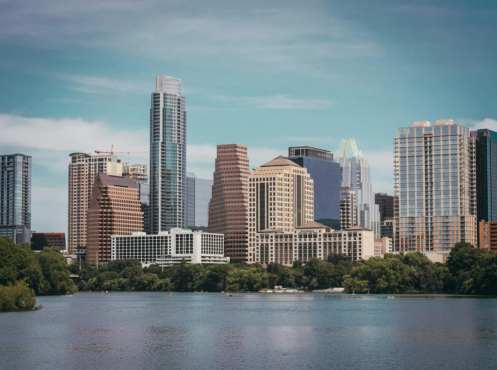 Downtown Austin office towers seen from the south on a clear morning.
