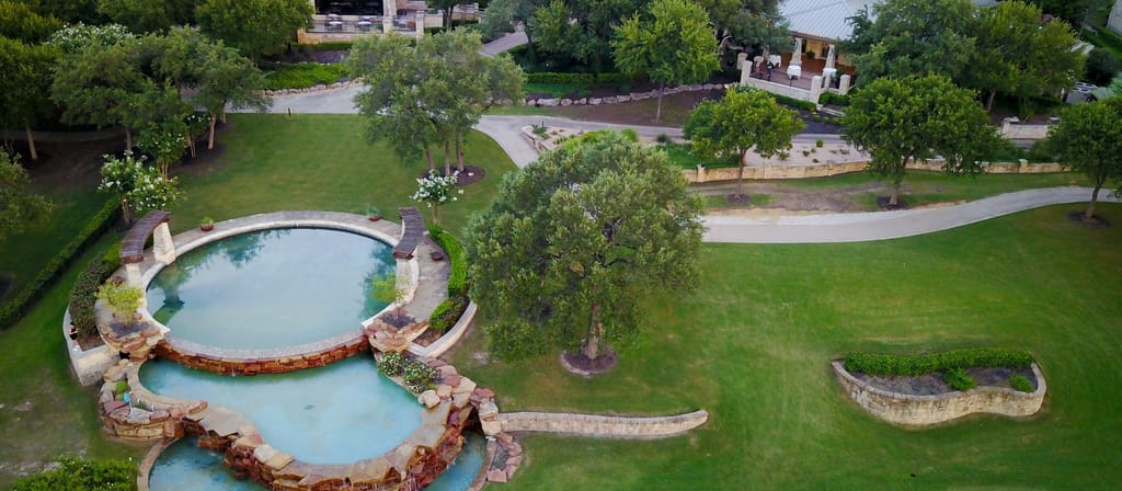 Rooflines across a master-planned neighborhood in northwest Austin.